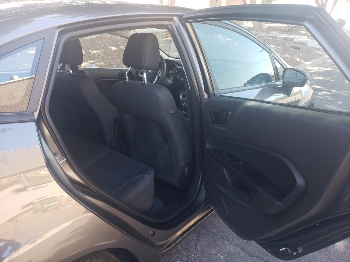 2019 /black Ford Fiesta SE (3FADP4BJ3KM) with an 1.6L L4 DOHC 16V engine, 6-Speed Automatic transmission, located at 323 E Dunlap Ave., Phoenix, AZ, 85020, (602) 331-9000, 33.567677, -112.069000 - 2019 Ford Fiesta SE,.....A Must See!!... No accidents,.... Ice cold AC. The car is gorgeous inside and out. Power windows, Power door locks, Stereo/ CD Player, Phone sync, Bluetooth, Backup camera, Beautiful Black interior with Black cloth seats in near perfect condition, Clean Arizona title , Runs - Photo#14